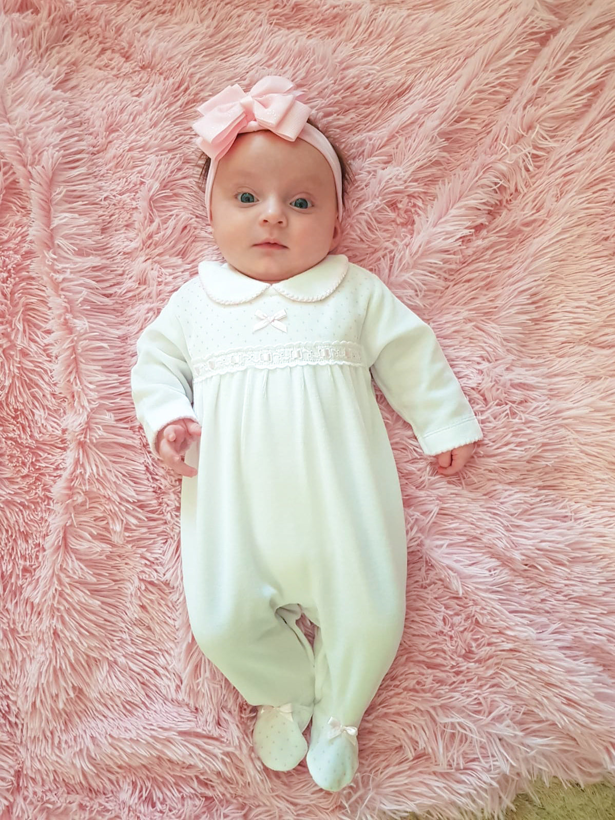 Baby wearing White and Pink Bow and Lace Sleepsuit