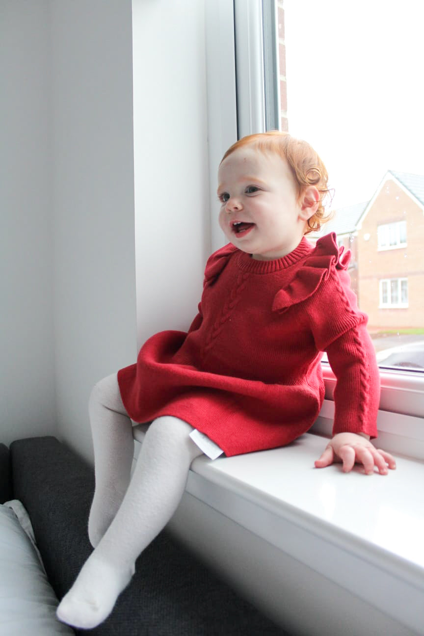 Baby Girl wearing Red Knitted Dress